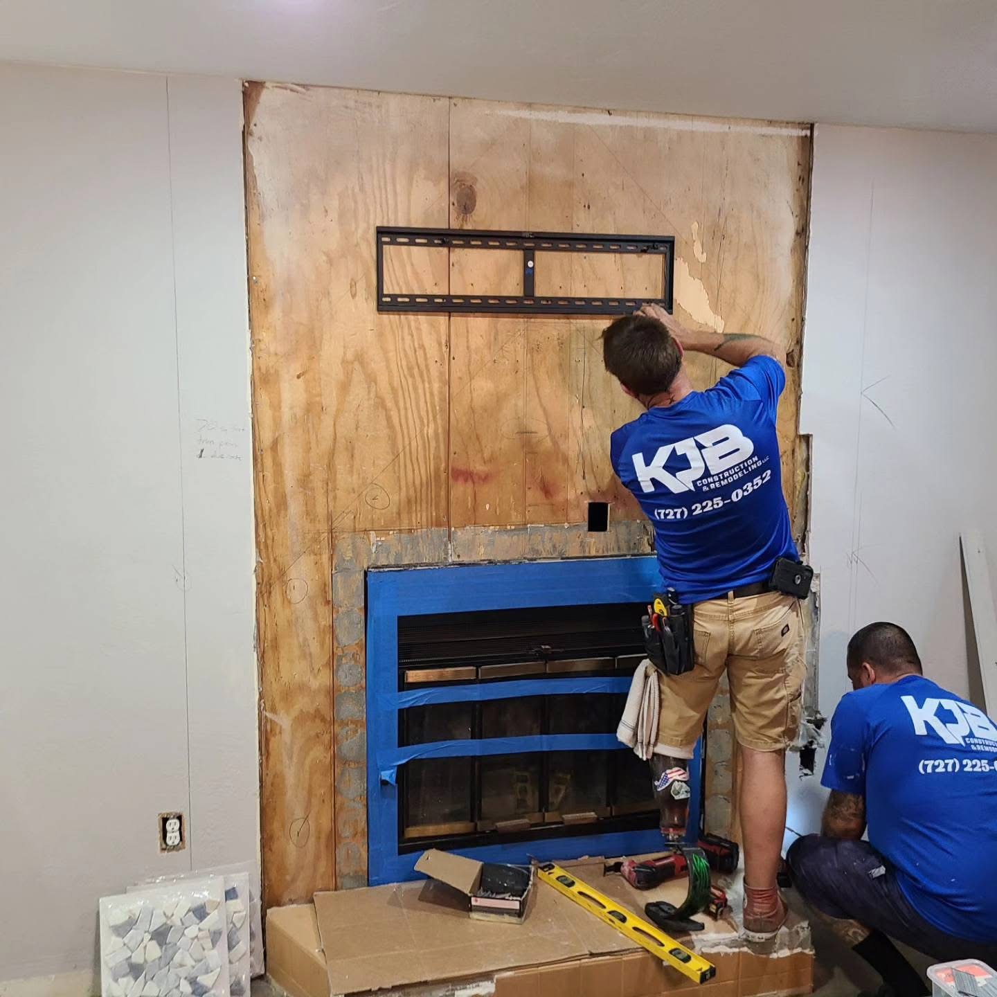 Fireplace installation and TV mounting